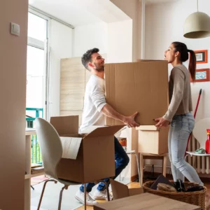 Man and woman moving house